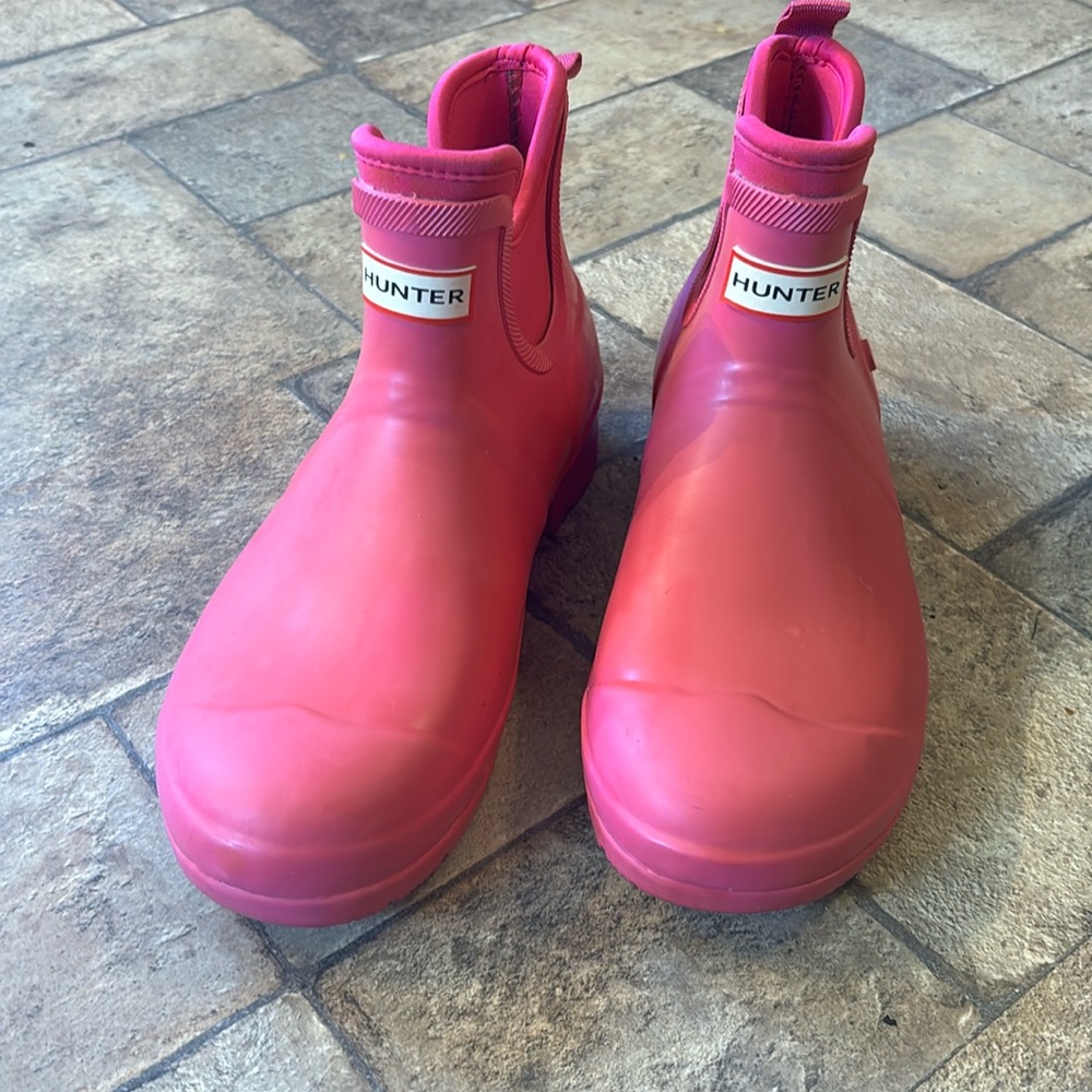 Hunter ankle height rain boots.